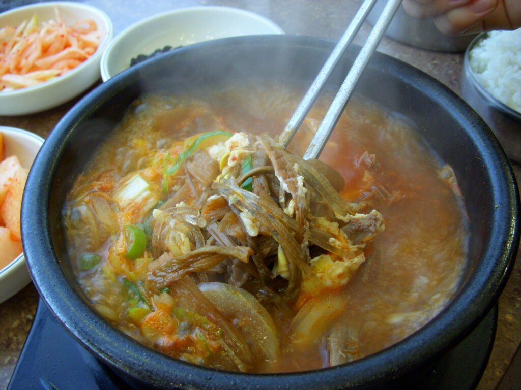 Yukgaejang, Korean spicy shredded beef soup with vegetables in a red gochugaru broth